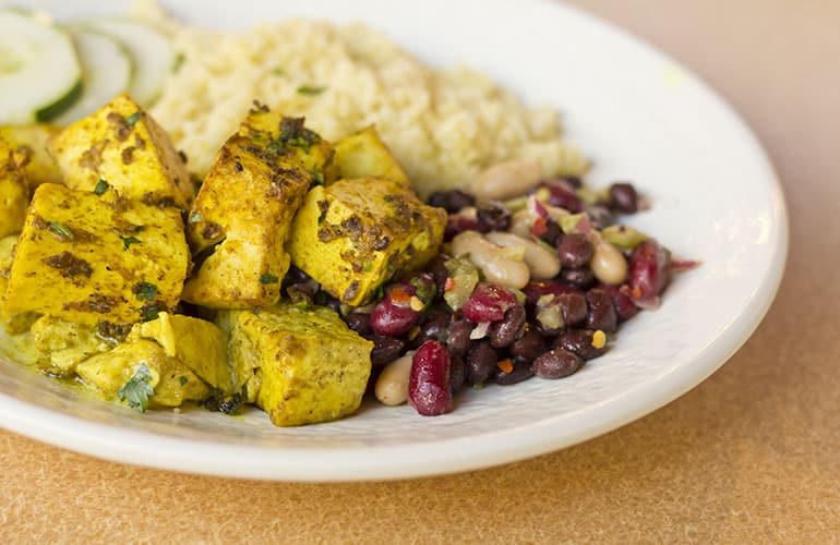 Paneer curry tofu with herbed quinoa and bean salad